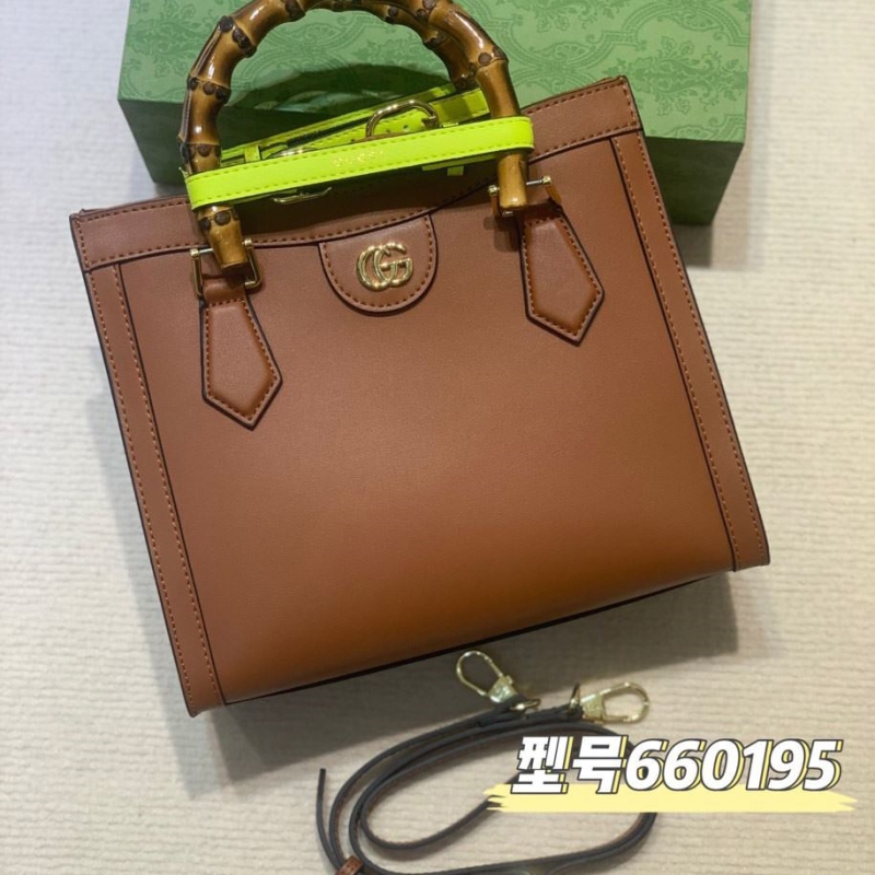 G*u*i top handle bags